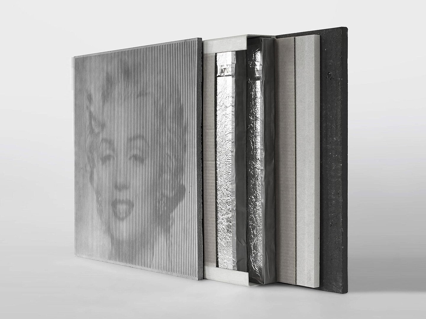 Das Modell zeigt den Schichtaufbau der schlanken vaku.tex-Fassade